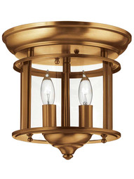 Gentry Flush Mount Ceiling Fixture With 2 Lights in Heirloom Brass.